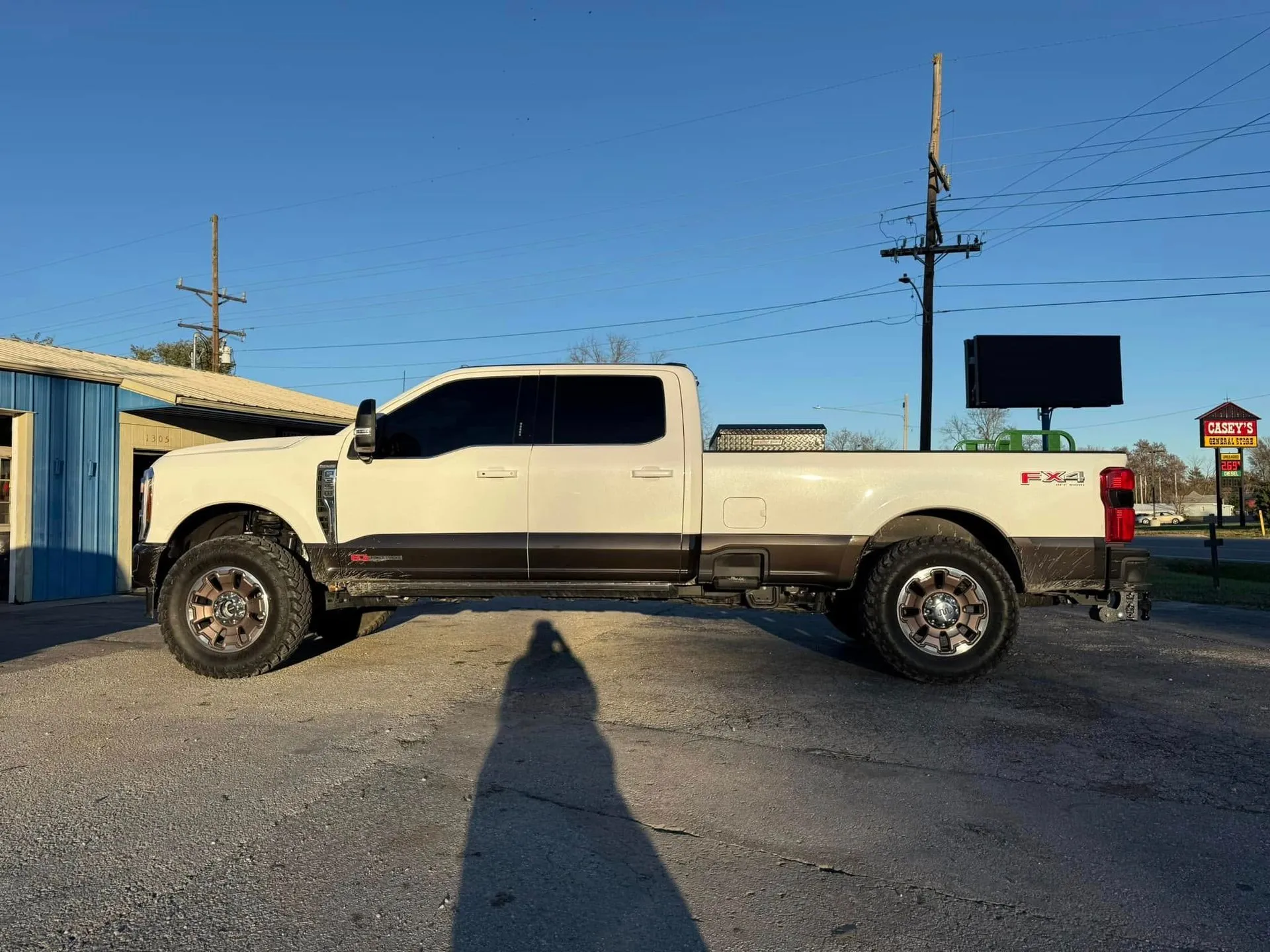 Lifted truck with oversized wheels and tires