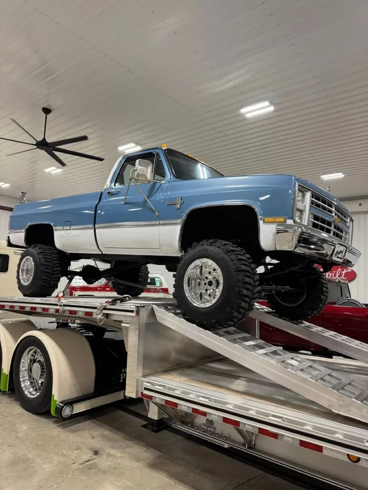 Lifted custom truck on oversized tires built by Midwest Custom Trucks