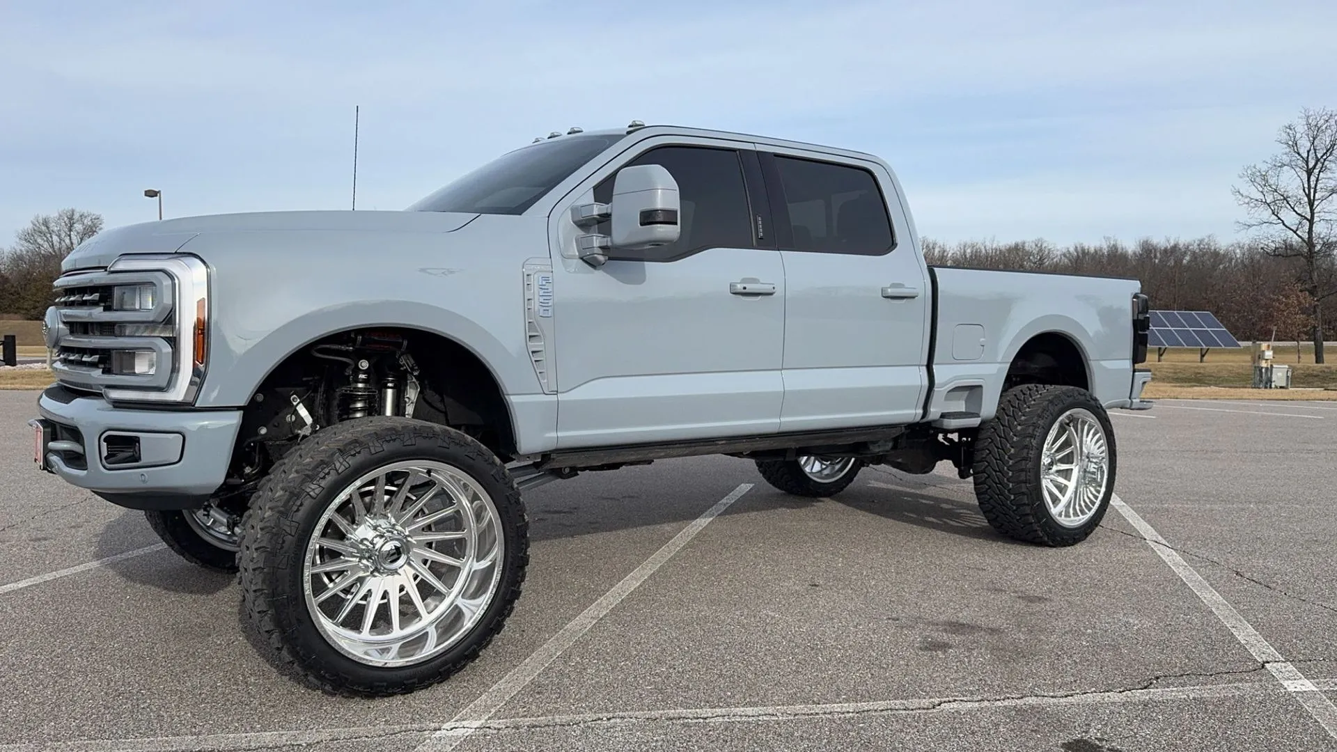 Truck fitted with oversized off-road wheels and tires