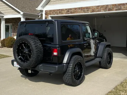 Jeep Wrangler on black milled off-road wheels